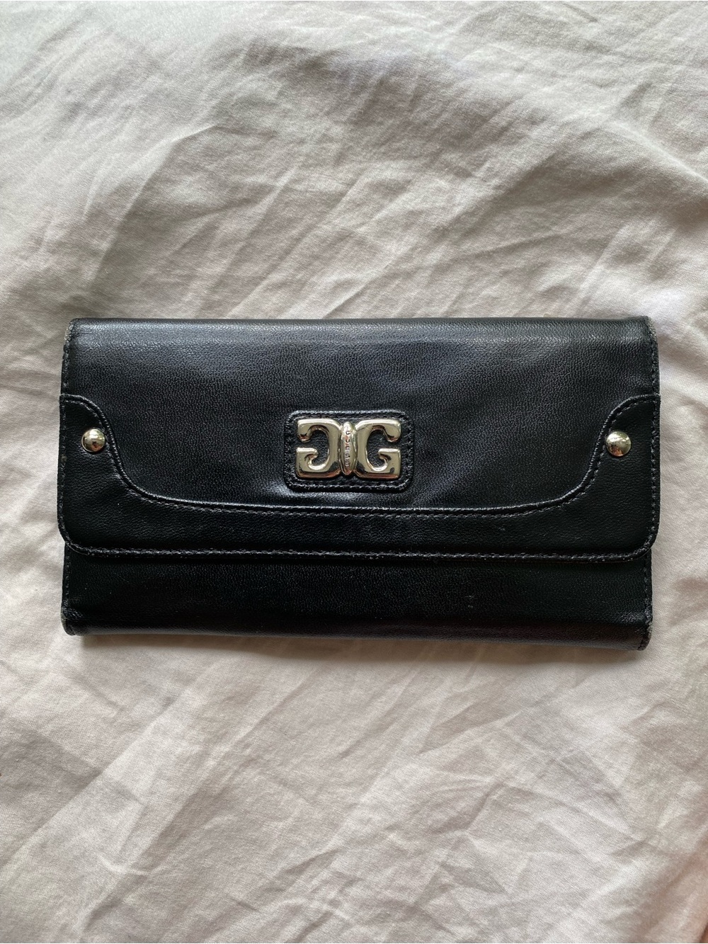 GUESS Leather Wallet with Silver Emblem Accent